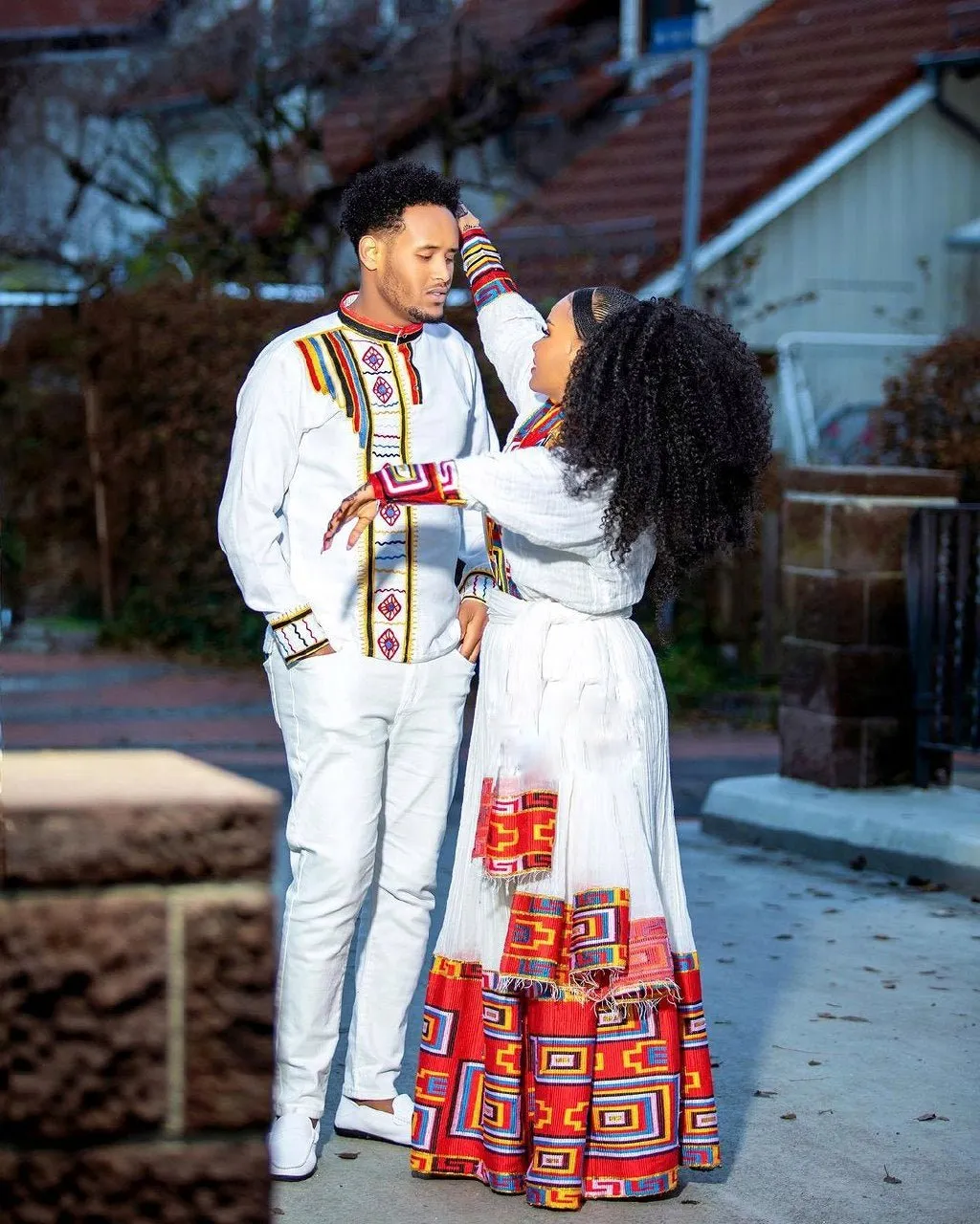 Crimson Splendor: Exquisite Patterned Habesha Couples' Attire